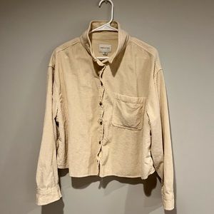 Textured button up top